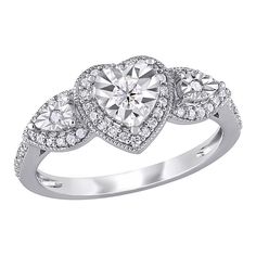 Add an enchanting touch to your ensemble when you wear this lovely Stella Grace diamond heart ring. Add an enchanting touch to your ensemble when you wear this lovely Stella Grace diamond heart ring. Width: 8.9 mm Metal: sterling silver Plating: rhodium Finish: polished Packaging: boxedDIAMOND DETAILS Total weight: 1/3 ct. Color grade: H-J Clarity: I3 Shape: round Setting: illusion, pave Gemstones may have been treated to enhance their appearance. Special care may be required. Please visit our G Heart Halo Ring, Heart Halo, Heart Engagement, Triple Heart, Heart Engagement Rings, Diamond Heart Ring, 3 Carat, Halo Ring, Sterling Silver Heart