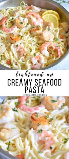 creamy seafood pasta in a pan with lemon wedges and parsley