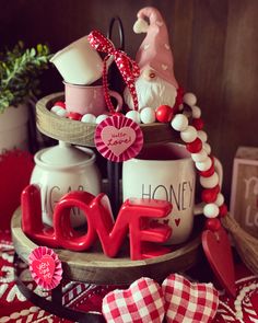 valentine's day decorations are arranged on a table