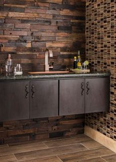 a bathroom with wooden walls and tile flooring on the wall is pictured in this image