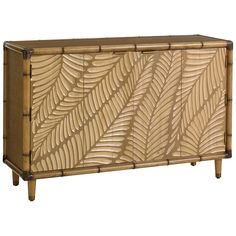 a wooden cabinet with an intricate design on the front and side panels, made out of bamboo