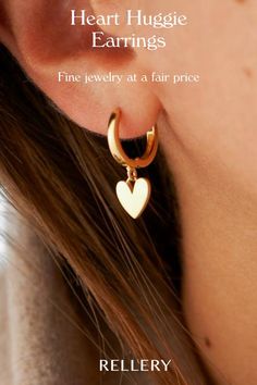 These heart earrings will be your new favorite everyday earrings. Classic and feminine, these huggie hoops make a simple statement as your sweetest new accessory. Stacked along multiple piercings to create your ultimate look. Earrings Classic, Multiple Piercings, Jewelry Gift Ideas, Small But Mighty, Ideas Jewelry, Gold Alloys, Heart Drop Earrings, 24kt Gold, Huggie Earrings