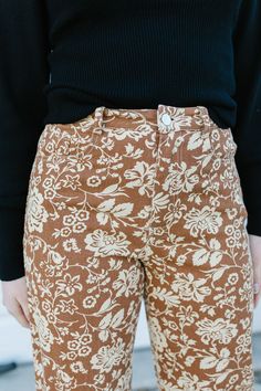 ALL SALES FINAL NOT ELIGIBLE FOR RETURN Step into style with the Keely Pant! These brown, floral-printed beauties are made from lightweight denim for all-day comfort. Featuring functioning buttons, pockets, and a zipper, plus sizes also have an elastic waistline. With a chic straight leg, these pants are a must-have for any wardrobe. The brand of these jeans are Polagram. Model is wearing a small and is 5'5". Shown wearing the Seely Sweater. Plus model is wearing a 1X and is 5'2". Shown wearing Plus Model, Sweater Plus, Brown Floral, Floral Printed, Straight Leg, Floral Prints, Plus Size, Elastic, Zipper