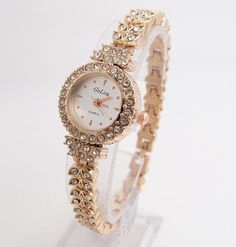 Movement: QUARTZClasp Type: Bracelet ClaspWater Resistance Depth: No waterproofStyle: Fashion & CasualCase Material: AlloyFeature: NoneDial Window Material Type: HardlexModel Number: G-022Band Length: 20cmBand Width: 8mmCase Shape: RoundBoxes & Cases Material: No packageBand Material Type: BRASSDial Diameter: 20mmCase Thickness: 8mmis_customized: Yes Rhinestone Rose, Crystal Dress, Rose Gold Watches Women, Gold Watches, Rhinestone Watches, Gold Watches Women, Bracelet Watches Women, Luxury Bracelet, Watches Women