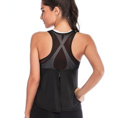 the back of a woman wearing a black sports bra