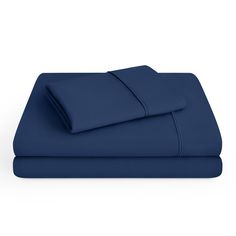 the blue sheets are folded on top of each other