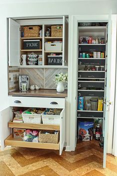 an organized pantry in the corner of a room