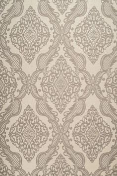 a beige and white wallpaper with an intricate design