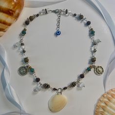 Beach Babe .ೃ࿐ Handmade with metal beads, silver, an authentic Florida seashell, and of course with love <3 Rustic Island, Ocean Sand, Boho Beachy, Beach Babe, Metal Beads, Halloween Shopping, Sea Shells, Jewelry Necklace Pendant, Pendant Necklaces