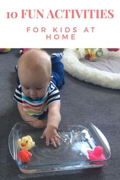 a baby playing with toys on the floor in front of a plastic tray that says 10 fun activities for kids at home