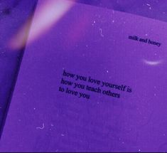 a purple book with the words how you love yourself is how you teach others to love you