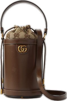 Gucci Luxury Bucket Bag With Leather Handles, Designer Coated Canvas Bucket Bag With Removable Pouch, Elegant Gucci Bucket Bag For Evening, Chic Gucci Bucket Bag For Evening, Classic Gucci Bucket Bag, Chic Gucci Evening Bucket Bag, Gucci Luxury Bucket Bag For Daily Use, Daily Use Gucci Luxury Bucket Bag, Daily Use Luxury Gucci Bucket Bag