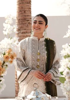 Brand: ZarqashProduct Code: Luxe-ZQ-09Collection: Zarqash Luxe Lawn Unstitched Spring Summer CollectionFabric: Lawn DESIGN DETAILS: Digital Printed Front Digital Printed Back Digital Printed Sleeves Digital Printed Trousers Digital Printed Silk Dupatta Embroidered Daman Border Embroidered Sleeves Border Embroidered Neck Patch DISCLAIMER:* Lining, Laces, and Tassels are not included in unstitched variants.* Embellishment items in stitched outfits are subject to market availability.* The actual colors of the outfit may vary from the colors being displayed on your device. CARE INSTRUCTIONS: Extra Fabric Has Been Used For Shoot Original Color May Vary Slightly From The Picture Dry Clean Recommended Iron The Clothes At Moderate Temperature Do Not Use Bleach, Or Stain Removing Chemicals Damp Fab Lawn Design, Pakistani Lawn Suits, Embroidered Sleeves, Pakistani Wedding Dresses, Printed Trousers, Silk Dupatta, Pakistani Wedding, Fabric Stores Online, Printed Silk