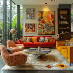 a living room filled with lots of furniture and art work on the wall above it