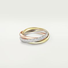 Cartier - Trinity ring, small model - Ring Gold/White gold/Gold - Trinity ring, small model, 18K white gold (750/1000), 18K rose gold (750/1000), 18K yellow gold (750/1000), set with 104 brilliant-cut diamonds totaling 0.46 carats. Width of one ring: 2.5 mm (for size 52). Please note that the carat weight, number of stones and product dimensions will vary based on the size of the creation you order. For detailed information please contact us. Trinity Cartier, Gold Trinity Ring, Trinity Necklace, Trinity Ring, The Trinity, Family Jewels, Wedding Rings Vintage, Hand Jewelry, One Ring