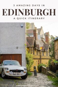 an old car is parked on the cobblestone street