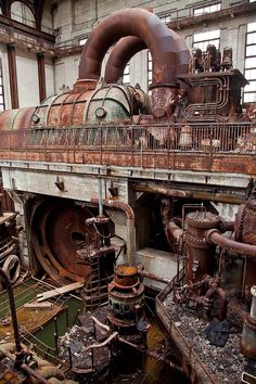 an old factory with pipes and machinery