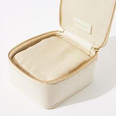 Meet the Jewelry Case- your perfect partner in crime for weekend getaways and vacations alike. Fabricated in our durable (and cleanable!) natural canvas and finished with a pebbled leather trim, the Jewelry Case is as pretty as it is functional. Complete with zip pouches inside, there’s room for all your baubles. The padded pouches will keep each piece from scratching and protect your more delicate pieces. Packing just got more fun! Luxury Cases With Removable Pouch, Classic Everyday Travel Accessories With Leather Trim, Everyday Rectangular Zipper Pouch Travel Accessory, Versatile Everyday Cases With Case Included, Everyday Pouch Case With Zipper, Mini Jewelry, Padded Pouch, Perfect Partner, Zip Pouch