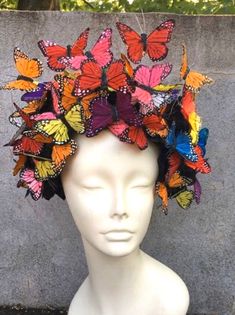 NYC Fascinator- Derby Hat -Monarch Headband- Butterfly Headpiece- Hair Accessory- Mad Hatter Party Hi. This butterfly headband/fascinator is made with multi color feather butterflies that are perched on a 5 black roses. The piece is about 7 inches high by 7 inches wide. Each butterfly is hand glued (wing by wing) in the back for extra support and makes it more durable than most butterfly headpieces. The fascinator is on a 1 inch matching covered headband that is adjustable to fit any head size a Butterfly Headpiece, Butterfly Headband, Wedding Accessories For Bride, Headband Fascinator, Mad Hatter Party, Derby Fascinator, Ascot Hats, Bride Hat, Hat Decoration