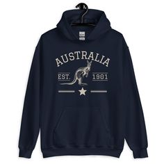 Australia Kangaroo Hoodie, Vintage Athletic Australia Jumper, Aussie Gift, Down Under Australia Pullover, Australia Sweatshirt Fleece Everyone needs a cozy go-to hoodie to curl up in, so go for one that's soft, smooth, and stylish. It's the perfect choice for cooler evenings! * 50% pre-shrunk cotton, 50% polyester * Fabric weight: 8.0 oz/yd² (271.25 g/m²) * Air-jet spun yarn with a soft feel and reduced pilling * Double-lined hood with matching drawcord * Quarter-turned body to avoid crease down Winter College Sweatshirt With Kangaroo Pocket, College Crew Neck Hoodie With Kangaroo Pocket, Crew Neck Hoodie With Kangaroo Pocket For College, Fleece Hoodie With Kangaroo Pocket And Crew Neck, Long Sleeve College Sweatshirt With Kangaroo Pocket, College Long Sleeve Sweatshirt With Kangaroo Pocket, College Hoodie With Long Sleeves And Kangaroo Pocket, College Long Sleeve Hoodie With Kangaroo Pocket, Crew Neck Top With Kangaroo Pocket For College