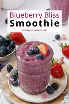 blueberry bliss smoothie on a plate with strawberries and berries in the background