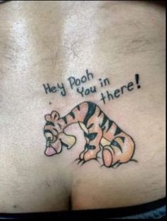 a woman with a tiger tattoo on her stomach that says hey pooh you in there