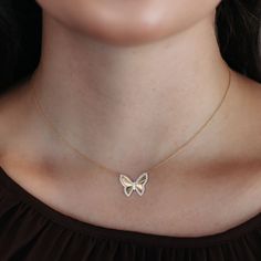 Fly into fashion with our fluted diamond Butterfly Collection necklace! Made of 14K yellow gold, this stunning piece features a delicate butterfly outline adorned with round brilliant cut diamonds. Flutter on over and add it to your collection today! Pair it with anything from our Butterflies Collection for an all-over charming look. Natural Diamonds: 0.25ctw 14K Yellow Gold Length: 18 Inches Diamond Butterfly Necklace In Yellow Gold, Fine Jewelry Diamond Butterfly Necklace In Yellow Gold, Yellow Gold Diamond Butterfly Necklace, Diamond Butterfly Necklace In Fine Jewelry Style, Yellow Gold Diamond Butterfly Necklace With Charm, Butterfly Shaped Diamond Necklace, Elegant Diamond Butterfly Necklace With Charm, Elegant Diamond Butterfly Charm Necklace, Fine Jewelry Butterfly Necklace With Diamond Accents