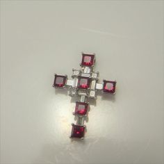 This astonishing vivid red no heat natural ruby and exceptional white natural diamond 18K gold cross is exceptional quality indeed. The diamonds each completely natural, untreated and earth mined of VS clarity and F color of excellent cut and make- these grades being the highest an appraiser can assign to set diamonds....The rubies each completely natural earth mined unheated and untreated perfectly cut and perfectly matched for color and princess cut for the setting itself. On the reverse stamp Elegant Red Cross Pendant Jewelry, Vintage Red Cross Jewelry, Spiritual Diamond-cut Cross Jewelry, Ruby Cross Pendant, Diamond-cut Cubic Zirconia Crucifix Necklace, Collectible Cross-shaped Jewelry With Large Pendant, Medieval Jewelry, Diamond Cross, Christian Cross