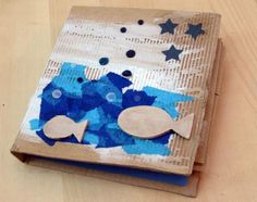 a book that has been made to look like an ocean scene with fish and stars on it