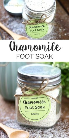 two jars filled with homemade foot soak sitting on top of a wooden table