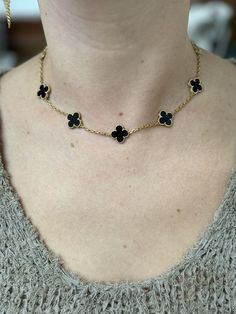 18k yellow gold 10 motif Vintage Alhambra necklace by Van Cleef & Arpels, with onyx. Retail $8900. DESIGNER: Van Cleef & Arpels MATERIAL: 18k Yellow Gold GEMSTONES: Onyx DIMENSIONS: Necklace is 16.75" long, clovers are 15mm x 15mm. MARKED/TESTED: CL41***, VCA 750. WEIGHT: 21.4 grams CONDITION: Previously Owned / Excellent Condition 10 Motif Necklace, Vintage Alhambra Necklace, Alhambra Necklace, Elizabeth Locke, Motif Vintage, Georg Jensen, Van Cleef Arpels, Van Cleef, Selling Jewelry