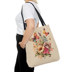 Cute Spring Bag, Summer Bag, Beach Bag, Flowers and Butterflies - Tote Bag - Made in the USA! This practical, high-quality Tote Bag is available in three sizes, providing comfort with style at the beach or out in town. Made from reliable materials, lasting for seasons. .: 100% Polyester .: Boxed corners .: Black inner stitching, transparent thread on hems. .: Black cotton handles .: With non-woven laminate inside .: Assembled in the USA from globally sourced parts Everyday Butterfly Print Tote Bag, Rectangular Travel Bag With Butterfly Print, Butterfly Print Bag For Gift, Summer Bags Beach, Spring Bags, Flowers And Butterflies, Bag Summer, Summer Bag, Cute Spring