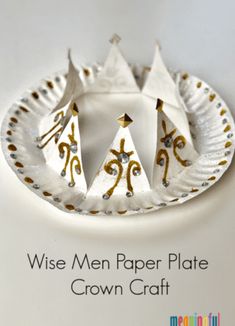 paper plate crown craft with gold and white designs on it that says wise men paper plate crown craft