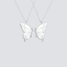 DESCRIPTION & DETAILS Introducing our enchanting Butterfly Wings Necklace, a stunning and graceful accessory that will capture hearts and imagination alike. This set includes not one, but two exquisitely crafted necklaces, each featuring delicate butterfly wings that evoke the beauty of these captivating creatures. Purchase TODAY and receive our "Wings of Connection: The Meaning of Friendship" E-book FREE! (Valued at $19.99) LOVE IS LIKE A BUTTERFLYIt's hard to catch and it's delicate, but it ha Elegant White Sterling Silver Butterfly Necklace, White Sterling Silver Butterfly Pendant Necklace, Sterling Silver White Butterfly Pendant Necklace, White Sterling Silver Butterfly Necklace With Clavicle Chain, Delicate Sterling Silver Butterfly Necklace In White Gold, Delicate White Gold Sterling Silver Butterfly Necklace, Delicate White Gold Butterfly Necklace In Sterling Silver, White Butterfly Charm Pendant Necklace, White Butterfly Pendant Necklace With Delicate Chain