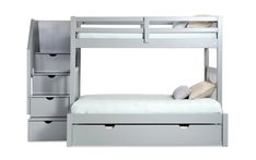 a bunk bed with drawers underneath it and a white pillow on the bottom one side