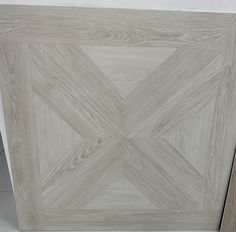 a close up of a wooden door with white paint