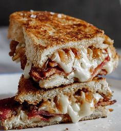 a grilled cheese and bacon sandwich on a plate