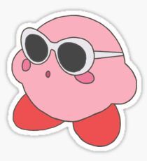 a pink sticker with sunglasses on it's face and an eye patch in the middle