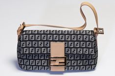 Collectible FENDI monogram canvas and leather baguette bag in very good condition, with minor wear on the hardware and handle. Approximate Measurements: Length 10”, Width 5” Comes with dust bag. Made in Italy 100% Authentic Please check my other listings! Leather Baguette Bag, Fendi Monogram, Baguette Bag, Monogram Logo, Monogram Canvas, Bags Handbags, Dust Bag, Fendi, Shoe Accessories