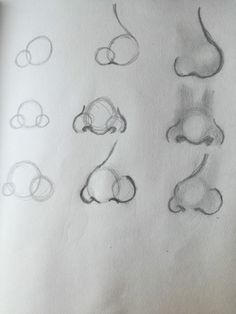 several drawings of different shapes and sizes on paper