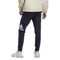 Slip on this pair of joggers from adidas for an off-duty day hanging with friends or lounging at home. They are made from soft cotton-jersey with an elastic-drawstring waistband, side and back pockets, and complete with the brand's iconic graphic logo along the side.Front Style: Flat FrontFeatures: Drawstring, Drawstring WaistClosure Type: Full ElasticFit: Regular FitPockets: 2 Side Slip Pockets, 1 Back Slip PocketRise: Mid RiseFiber Content: 100% CottonFabric Description: JerseyInseam: 29 3/4 I Adidas Sporty Relaxed Fit Joggers, Relaxed Fit Athleisure Adidas Joggers, Adidas Logo Sweatpants For Training, Adidas Athleisure Joggers With Logo, Sporty Adidas Joggers With Relaxed Fit, Adidas Cotton Joggers With Three Stripes, Adidas Sweatpants With Logo For Training, Adidas Moisture-wicking Joggers For Streetwear, Adidas Cotton Activewear