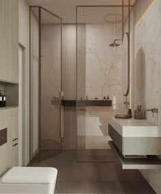 a modern bathroom with marble walls and flooring