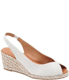 From Andre Assous&#x2C; the Audrey Fabric Espadrille Wedge Sandals feature: fabric upper Slip-on closure with elastic gore for ease of entry Leather lining Cushioned insole Leather outsole approx. 2.5" wedge height approx. .25" platform height Imported. White Fabric Wedge Sandals For Summer, Closed Toe Fabric Wedge Sandals For Vacation, Chic Fabric Wedge Heel Sandals, Fabric Wedge Heel Sandals With Cushioned Footbed, Fabric Wedge Heel Sandals For Summer, Summer Fabric Wedge Sandals, Slip-on Synthetic Wedge Sandals For Summer, Summer Slip-on Espadrille Wedge Sandals, Slip-on Synthetic Wedge Sandals With Round Toe