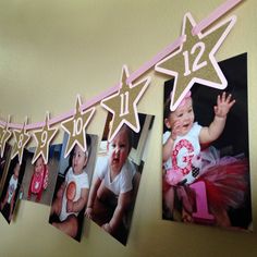 some pictures are hanging on the wall with pink and gold stars around them that spell out 21st birthday