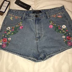 Cute!! Embroidered Jean Shorts New With Tag. European Sizing - Us Juniors Size 10 But Runs A Bit Small. Nonsmoking Home Embroidered Mid-rise Summer Pants, Casual Embroidered Jean Shorts For Summer, Trendy Embroidered Mid-rise Bottoms, Embroidered Mid-rise Pants For Summer, High Waist Cotton Pants With Floral Embroidery, Casual High Waist Pants With Floral Embroidery, Casual Mid-rise Pants With Floral Embroidery, Summer Mid-rise Pants With Floral Embroidery, Casual Mid-rise Embroidered Pants