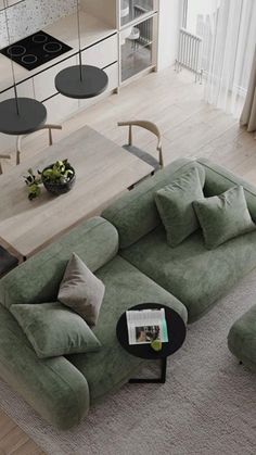 a living room filled with furniture and a coffee table