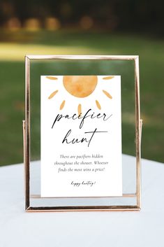 a white table with a gold frame and a sign on it that says, peacer krutt