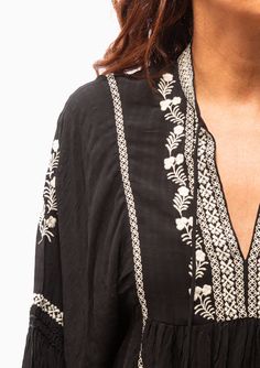 The quintessential bohemian blouse from Vanessa Brno, the Baltik features a Tunisian neckline with fine ties and tassels, and large 3/4 puffed sleeves thanks to elasticated hems in a speckled print. 100% Viscose Dry Clean Model is 5’8” and wearing a size 36. Runs true to size, we recommend taking your usual size. Model’s Measurements: 26” waist 34” hips 34" bust Bohemian Blouse, Tiered Tops, Bohemian Blouses, Woman's Fashion, Embroidery Designs Fashion, Fashion Diy, Vanessa Bruno, Perfect Wardrobe, Jewelry Outfit