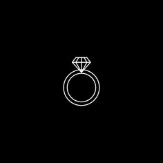 a ring with a diamond on it in the middle of a black background and white outline