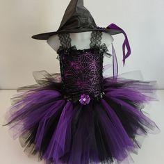 Witch disguise, tutu dress Short tutu dress with witch hat - The dress is made to order with soft black tulle and fuchsia, mauve or orange tulle - Numerous knee length tulle bands give a nice volume to this costume - The stretchy crochet bustier fits all little girls well.    It is covered on the front with spider pattern veil.  - Satin ribbon or lace decorates the dresses. A matching witch hat comes with the dress. Wash at 30o. Discover in my store TutusDeReves all my creations of tutu dresses for children: princess, carnival or Halloween costume, ceremony dress https://www.etsy.com/fr/shop/TutusDeReves?ref=shop_sugg Short Tutu Dress, Witch Tutu Costume, Baby Witch Costume, Halloween Tutu Costumes, Crochet Bustier, Kids Witch Costume, Witch Tutu, Costume Carnaval, Witch Costumes